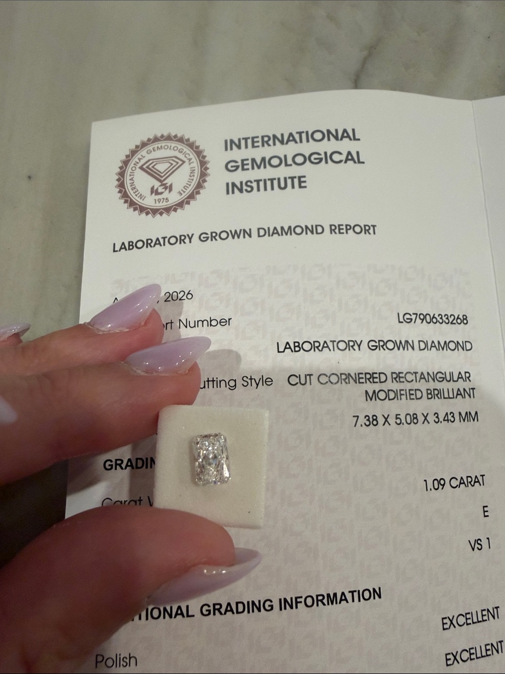 1.09 Ct. Rectangular modified brilliant diamond IGI CERT INCLUDED *never worn!-*